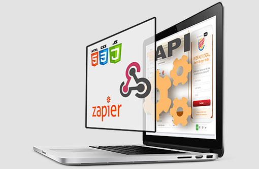 Coupontools API, Webhooks and Zapier on a laptop screen.